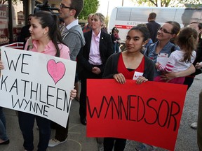 In this file photo, local liberals and supporters wait for Premier Kathleen Wynne at the headquarters of MPP Teresa Piruzza Tuesday May 20, 2014.  Hundreds jammed the small office to hear and see Premier Wynne.   (NICK BRANCACCIO/The Windsor Star)