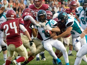 Essex running back Khaliel James is tackled by the Niagara Spears during the conference finals at Raiders Field last year. (JOEL BOYCE/The Windsor Star)