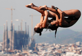 Canadians Meaghan Benfeito and Roseline Filion perform during the women's 10-metre platform final at the FINA Swimming World Championships in Barcelona, Spain last year. (AP Photo/Michael Sohn)