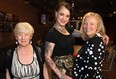 Christine Fullerton, left, Sarah Desrosiers and Michelle Fullerton attend Elaine Chatwood's Chatty Collection fashion show at The Star's News Cafe Wednesday May 28, 2014. (NICK BRANCACCIO/The Windsor Star)