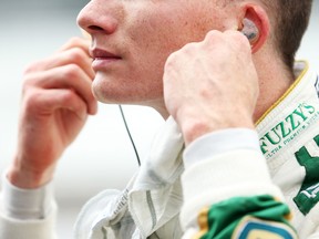 English driver Mike Conway stands on pit lane during qualifying for the Grand Prix of Indianapolis at Indianapolis Motor Speedway. (Photo by Nick Laham/Getty Images)
