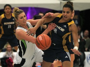 Lancers guard Miah-Marie Langlois, right, battles with Fraser Valley's Kayli Sartor at the St. Denis Centre. (DAX MELMER/The Windsor Star)