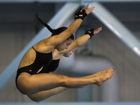 Canada's Meaghan Benfeito and Roseline Filion finished in first place in the women's 10m synchro platform at the FINA Diving World Series at the Windsor International Aquatic and Training Centre Friday. (DAX MELMER/The Windsor Star)