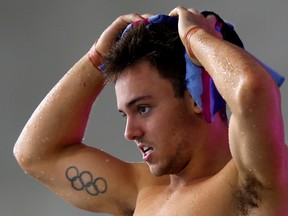 Great Britain's Tom Daley warms up prior to the men's 10m platform final at the FINA Diving World Series in London. (Photo by Clive Rose/Getty Images)