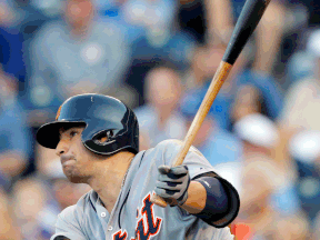 Detroit's Nick Castellanos hits a sacrifice fly against Kansas City relief pitcher Danny Duffy during the fourth inning Saturdy in Kansas City. (AP Photo/Orlin Wagner)