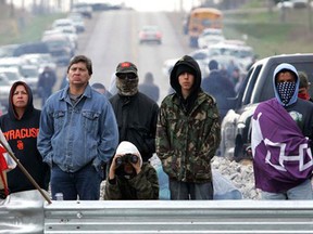 Protesters stand at a road block in Caledonia, Ont., in April 2006. (Postmedia News files)