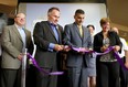 A Windsor International Aquatic and Training Centre grand opening ceremony was held Friday, May 9, 2014. From left, Windsor councillor Fulvio Valentinis, WFCU president Marty Komsa, Mayor Eddie Francis and MPP Teresa Piruzza cut the ceremonial ribbon. (RICK DAWES/The Windsor Star)