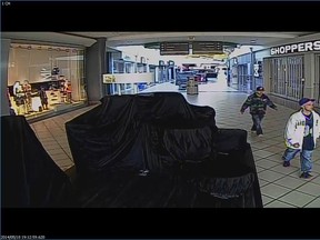 A security camera image of two males who broke into Devonshire Mall on a theft spree on the evening of May 18, 2014. (Handout / The Windsor Star)