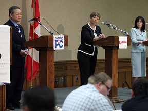 Windsor West candidates Henry Lau, Teresa Piruzza and Lisa Gretzky take part in the Windsor-Essex Regional Chamber of Commerce 2014 provincial election debates at the Caboto Club in Windsor on Thursday, May 29, 2014.              (TYLER BROWNBRIDGE/The Windsor Star)