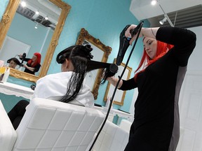 tylist Dea Couture works on Anna Cabrera's hair at Dry Parlour Inc. in Windsor on Thursday, May 15, 2014.             (TYLER BROWNBRIDGE/The Windsor Star)