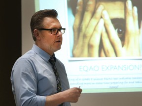 Andrew Campbell, a Grand Erie elementary school teacher delivers a speech on deconstruction EQAO during a forum held at the Ciociaro Club in Tecumseh, Ontario on May 14, 2014. (JASON KRYK/The Windsor Star)