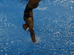 Jennifer Abel practises at the Windsor International Aquatic and Training Centre Monday, May 26, 2014. (TYLER BROWNBRIDGE/The Windsor Star)