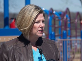 NDP Leader Andrea Horwath speaks at Pier 4 Park in Hamilton on Sunday, May 11, 2014 where she announced her party's commitment to child care. (Peter Power/The Canadian Press)