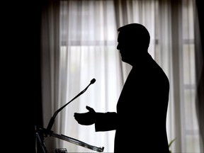 A silhouette of PC Party leader Tim Hudak speaking at an event in Ottawa on May 13, 2014. (Sean Kilpatrick / The Canadian Press)
