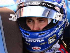 Graham Rahal takes a break during practice for the Verizon IndyCar Series 2014 Chevrolet Detroit Belle Isle Grand Prix at the Raceway at Belle Isle Park on May 30, 2014 in Detroit, Michigan.  (Photo by Robert Laberge/Getty Images)