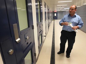 Correctional worker Peter Petroni is shown in a segregation unit at the South West Detention Centre in Windsor, Ont. on Friday, May 2, 2014.  (DAN JANISSE/The Windsor Star)