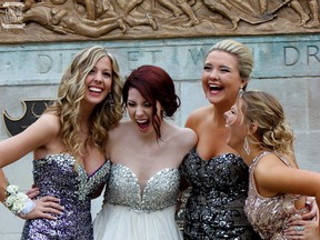 From left, Olivia Belliveau, Aleksandra Murphy, Colette Serre and Katie Callender pose before the St. Joseph’s Catholic High School prom at the Caboto Club on May 9, 2014.  (Photo: Taylor LeBlanc)
