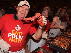 John Jones was one of many guest servers during 30th Anniversary of Lobsterfest Maritime Party presented by the Rotary Club of Windsor-Roseland held at Ciociaro Club of Windsor Friday May 30, 2014. (NICK BRANCACCIO/The Windsor Star)