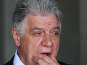 London Mayor Joe Fontana is seen during a break at the London, Ont., courthouse on the first day of his fraud trial Monday, May 26, 2014. THE CANADIAN PRESS/Dave Chidley