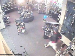 A surveillance camera image of the man who stole a electric guitars from Long & McQuade Music store on Walker Road on Oct. 15, 2013. (Handout/The Windsor Star)