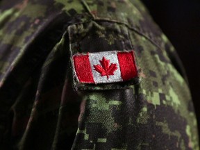 In this file photo, this is the arm patch Canadian flag of Lt.-Col. David Lafreniere who is the focus of a feature for "National Day of Honour" for the Canadian forces' Afghanistan mission. (JASON KRYK/The Windsor Star)