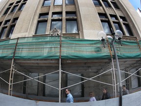 In this file photo, given the fact the Paul Martin Building is expected to start dropping chunks of stone facade into the street, unsuspecting pedestrians are at increasing risk of injury.
DAN JANISSE/The Windsor Star) (For story by Doug Schmidt)