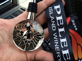 The medal for this year's Pelee Island half marathon is truly a keeper. A medal and a wine stopper, a great combination. (Running Flat photo)