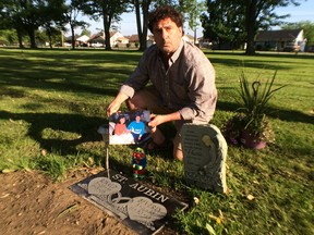 May 29, 2014l Carl St. Aubin is upset with the company who made his mother's tombstone: they got the date wrong. (Jason Kryk/The Windsor Star)