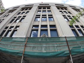 The scaffolding at the Paul Martin Building in downtown Windsor, on May 23, 2014.  (DAN JANISSE/The Windsor Star)