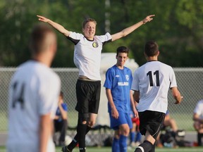 Filip Vicicevic celebrates after scoring against Villanova in the WECSSAA boys AAA soccer final in Windsor, Ontario on May 26, 2014. (JASON KRYK/The Windsor Star)