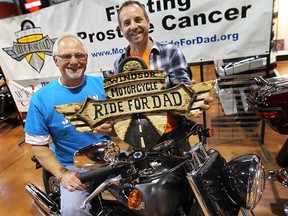 Organizers of the Windsor Motorcycle Ride for Dad held a media conference Thursday, May 1, 2014, to detail this year's fundraising efforts. Ian Bentley (L) a prostate cancer survivor and Shane Miles, chair of the event pose for the photo at the Thunder Road Harley dealership in Windsor, Ont. where the event was held.  (DAN JANISSE/The Windsor Star)