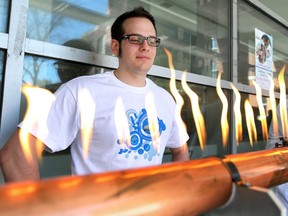 Dante Capaldi, a physics student at the University of Windsor, displays a Ruben's Tube at Science Rendezvous at the University of Windsor, Saturday, May 7, 2011.  The tube is used to visualize sound, as audio frequencies are injected into the tube which then change the size of the flame depending on the frequency.  (DAX MELMER/The Windsor Star)