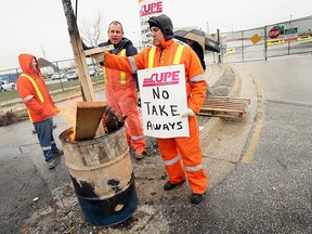 CUPE union members block the gates to the refuse transfer station in Windsor on April 15, 2009.