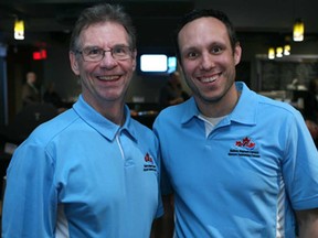 Dave Wikin, left, president of Masters Swim Canada, and Chrystian Gauvin, chair of the Nationals Committee, attend a meet and greet for the Canadian Masters National Swimming Championships at the Winsor Star News Cafe, Friday, May 16, 2014.   (DAX MELMER/The Windsor Star)