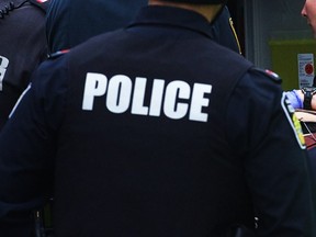 A police officer in tactical gear in Toronto is shown in this March 2014 file photo. (Victor Biro / The Canadian Press)