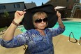 Melanoma cancer survivor Kelly Rosaasen knows she has to protect herself from the sun, and hopes to bring awareness to the harmful affects, May 29, 2014. (NICK BRANCACCIO/The Windsor Star)
