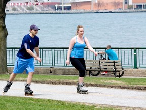 People enjoy the path along the riverfront during the unusually warm weather Thursday, May 08, 2014. (JOEL BOYCE/The Windsor Star)