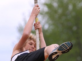 Aric Aiton of Sandwich competes in the pole vault on Thursday, May 15, 2014, during the WECSSA track and field championships at the Robert Carrick Complex at Sandwich.  (DAN JANISSE/The Windsor Star)