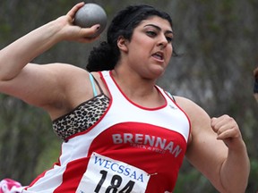 Alexandra Hanna of Brennan competes in the shot put on Thursday, May 15, 2014, during the WECSSA track and field championships at the Robert Carrick Complex at Sandwich.  (DAN JANISSE/The Windsor Star)