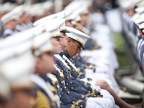 The 2013 graduating cadets listen at the United States Military Academy at West Point during the commencement ceremony May 25, 2013 in New York. Most USMA graduates are commissioned as second lieutenants in the US Army. (Ramin Talaie/Getty Images)