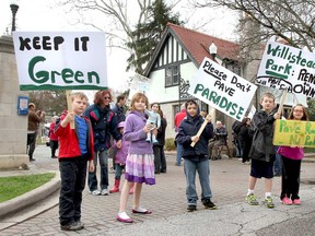 Young protesters attend a rally held at Willistead Park on Saturday, May 3, 2014. Residents walked around the park protesting the construction of new asphalt pathways, which the City of Windsor has approved. (REBECCA WRIGHT/ The Windsor Star)