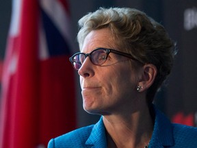 Ontario Liberal Party leader Kathleen Wynne listens at an economic summit in Toronto on May 13, 2014. (Chris Young / The Canadian Press)