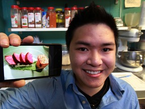 University of Windsor student Jason Heung displays a recipe for Perfect Oven Steak on a recipe app he has designed. (NICK BRANCACCIO / The Windsor Star)