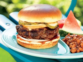 Add a twist to your usual homemade burger recipe and turn them into “bronco burgers.” These are mixed with barbecue sauce topped with smoked mozzarella.  (Tim Turner / Weber’s Big Book of Burgers)