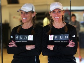 Theresa Carriere, who had a double mastectomy in 2007, plans another 100-kilometre run from Sarnia to London on June 13 to raise money to fight breast cancer. She’s shown at GoodLife Fitness in Windsor. (DAN JANISSE / The Windsor Star)