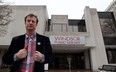 Former Windsor Public Library CEO Barry Holmes stands at the front entrance of Central Branch in this 2011 file photo. (NICK BRANCACCIO/The Windsor Star)