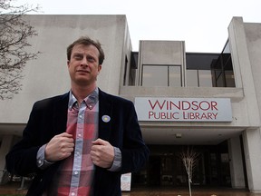 Former Windsor Public Library CEO Barry Holmes stands at the front entrance of Central Branch in this 2011 file photo. (NICK BRANCACCIO/The Windsor Star)