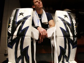 Phoenix goalie Sean Burke takes a break after practice. (WAYNE CUDDINGTON/Ottawa Citizen)