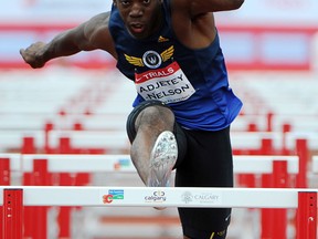 Windsor's Jamie Adjetey-Nelson competes in the 110 metre hurdles during the decathlon event at the Canadian Track and Field Championships in Calgary in 2012. (THE CANADIAN PRESS/Sean Kilpatrick)