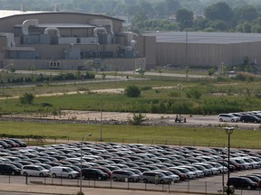 Massive parking lot next to WFCU Centre on Lauzon Road is filling up fast, not with fans heading to the WFCU, but with brand new Windsor-built Chrysler Town and Country and Dodge Grand Caravans June 17, 2014. (NICK BRANCACCIO/The Windsor Star)